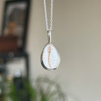 Cowrie pendant