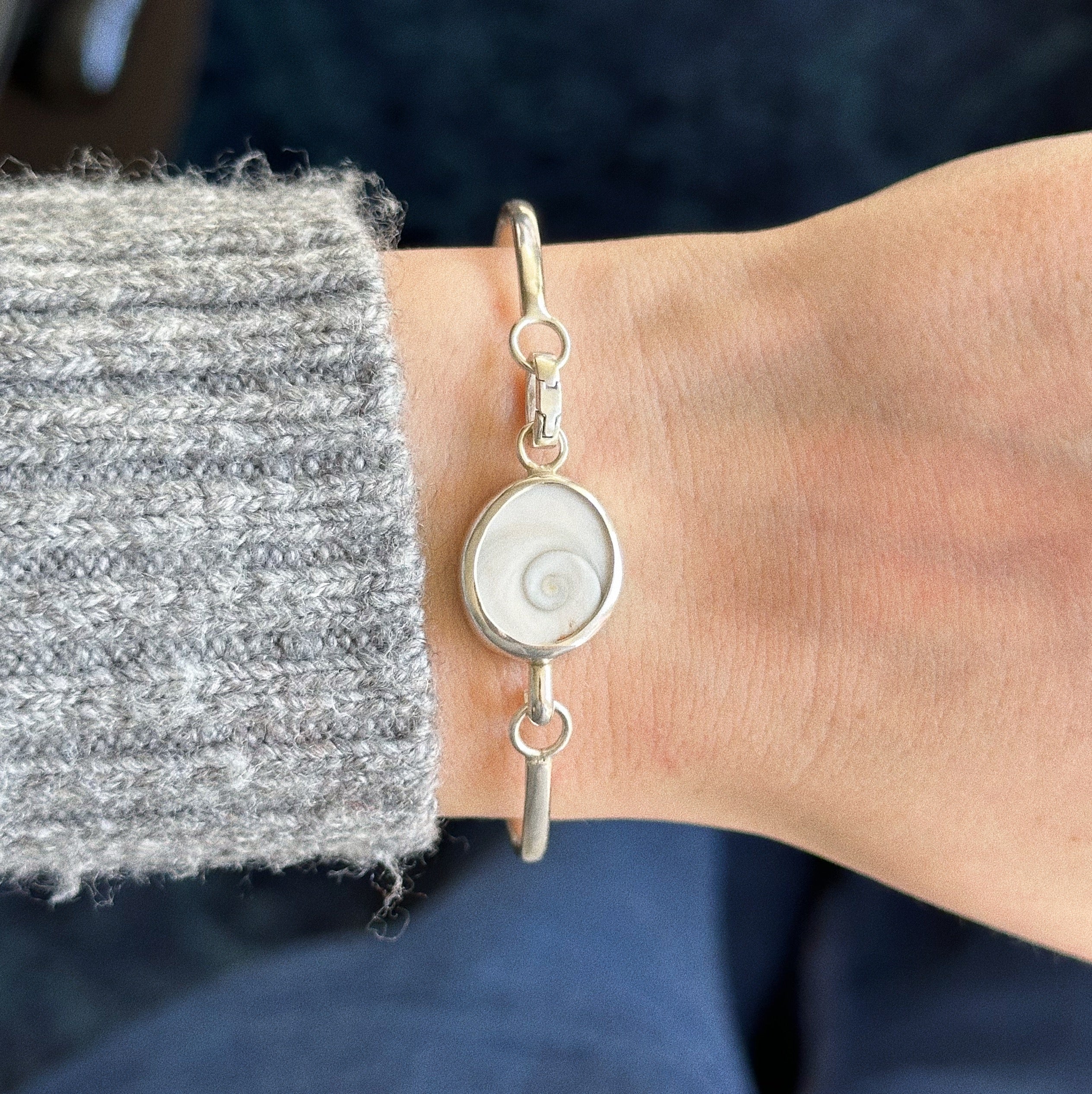 Operculum cuff charm