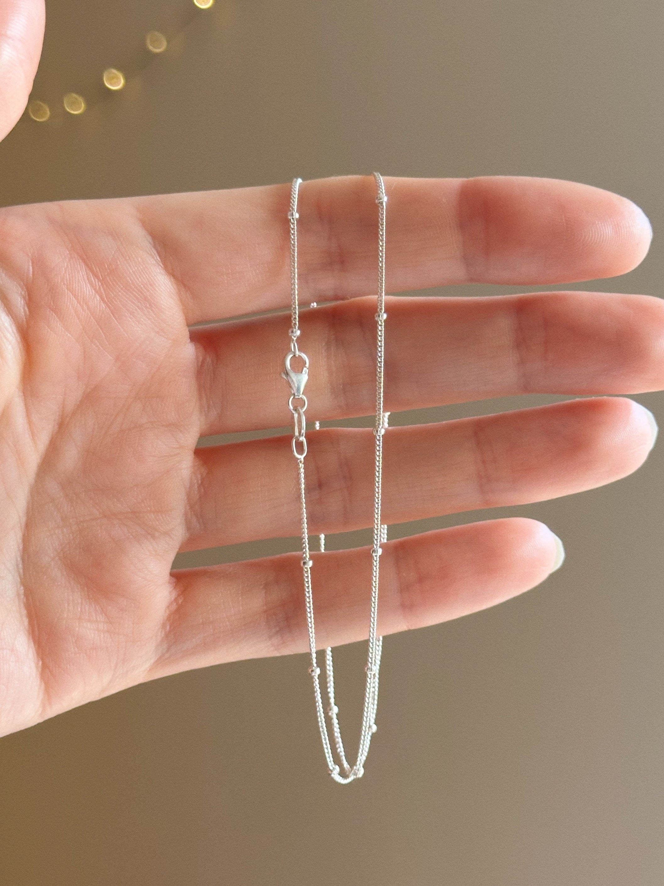 Satellite charm keeper chain