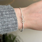 Swirly oval magic cuff