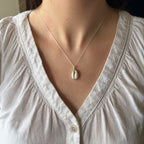 Cowrie pendant
