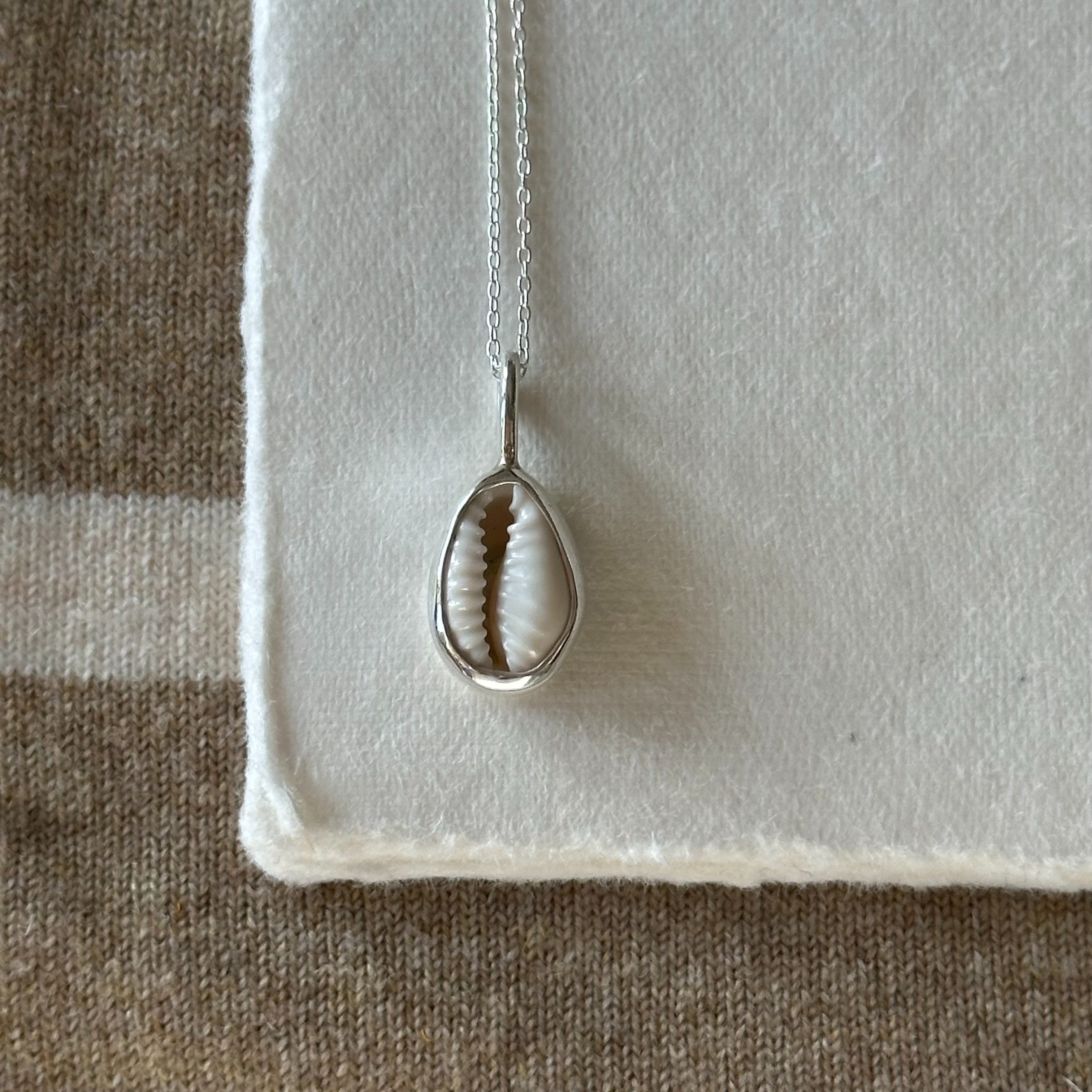 Cowrie pendant