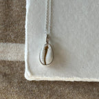 Cowrie pendant