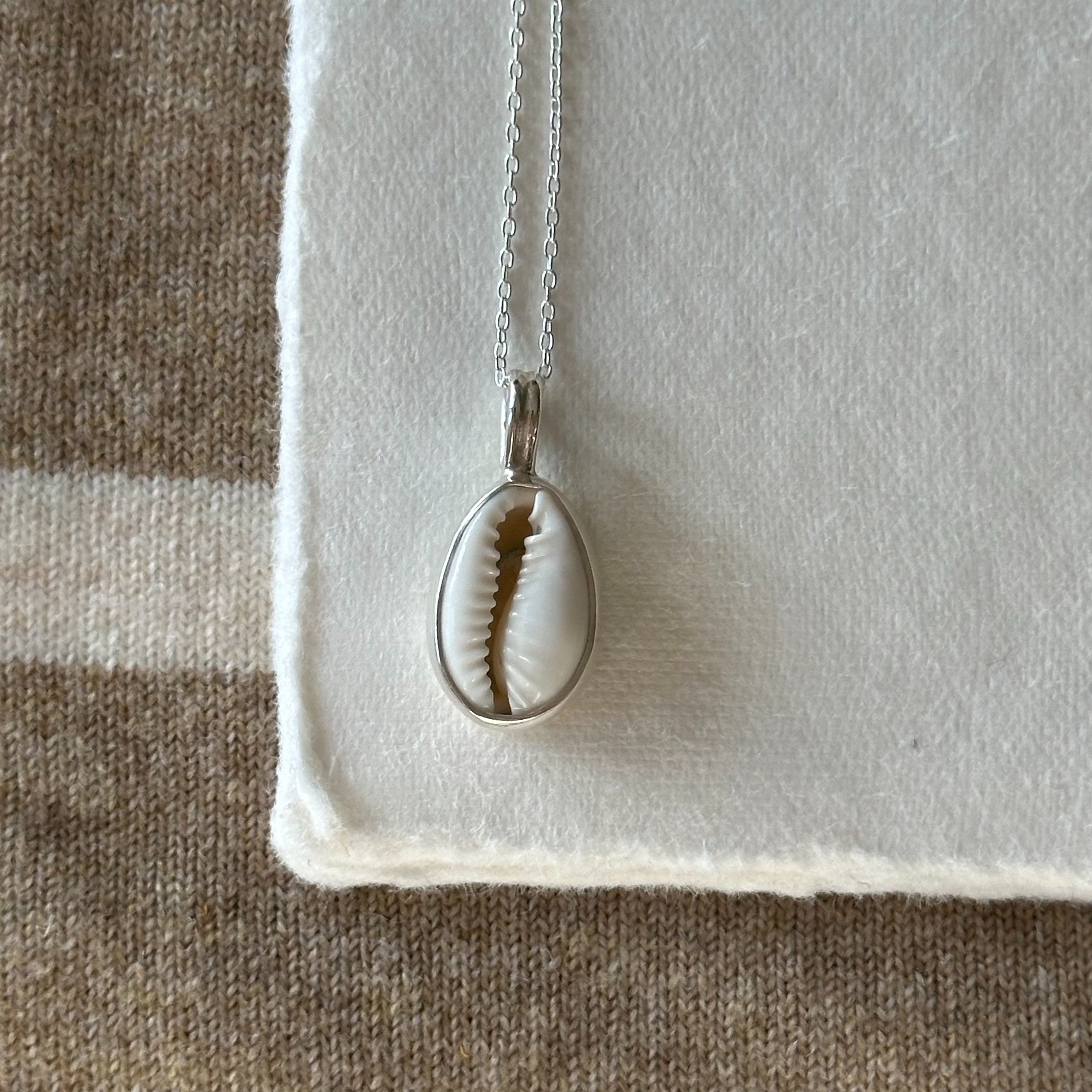 Cowrie pendant
